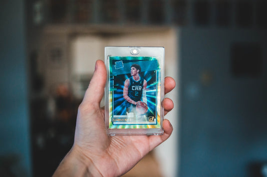 a person holding a card in their hand